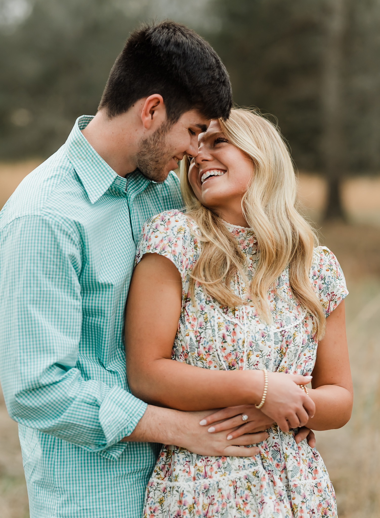 A man hugs his fiance