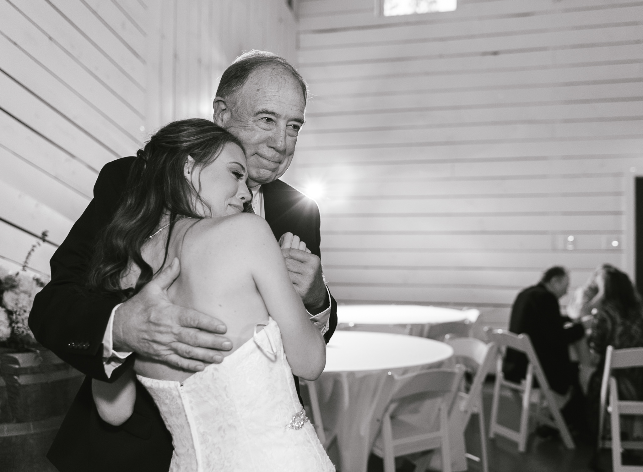 a bride dancing with her grandfather at her intimate wedding reception